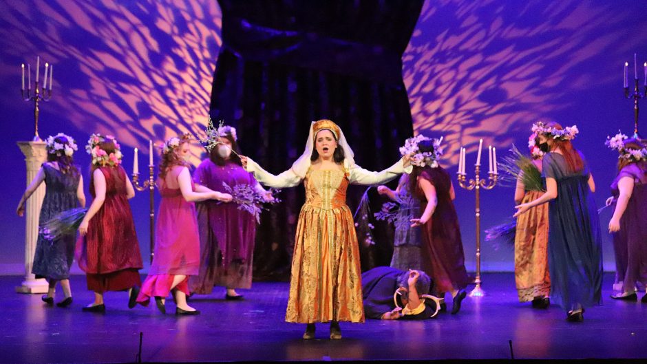 Women perform on stage