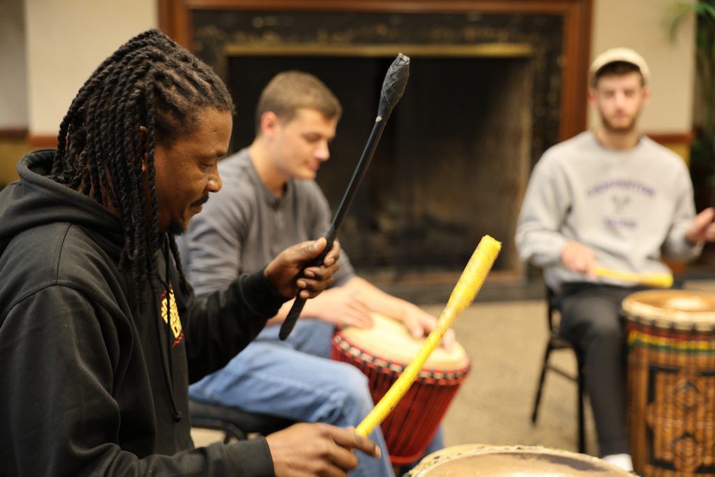 Sipho Ngcamu demonstrates technique to percussion students at Mizzou.