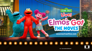 Elmo and friends stand on stage, arms outstretched in welcome.