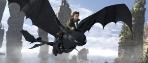 Hiccup and Toothless soaring through the sky.